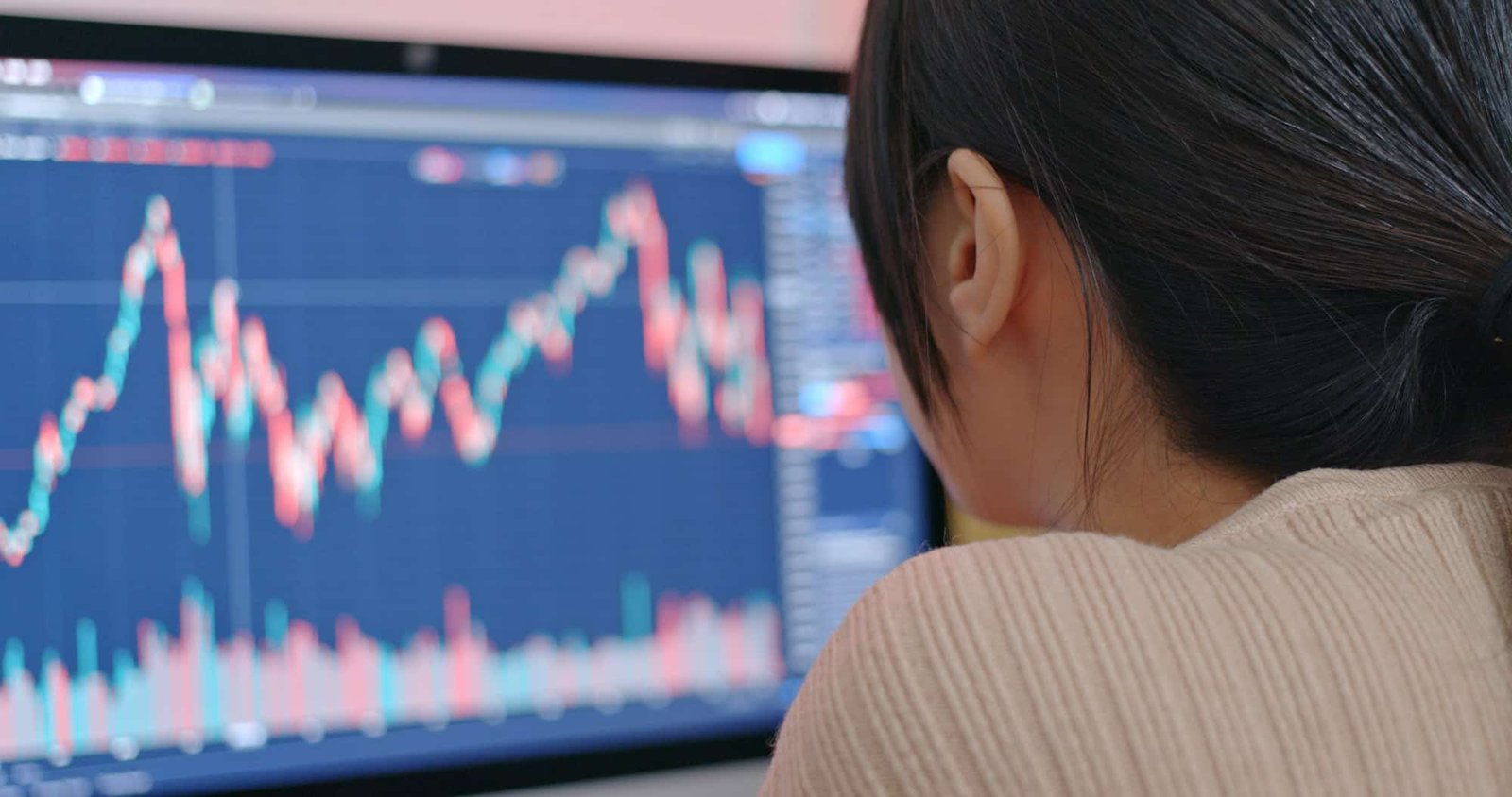 Woman study the stock market data